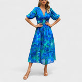 Jorė – Elegantiška gėlėta midi suknelė
