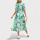 Jorė – Elegantiška gėlėta midi suknelė