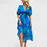 Jorė – Elegantiška gėlėta midi suknelė