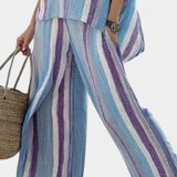 Lucie – elegantiškas topas pastelinių mauve spalvų ir dryžuotos lino kelnės