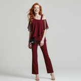 Edita – Nesenstanti elegancija atvirais pečiais